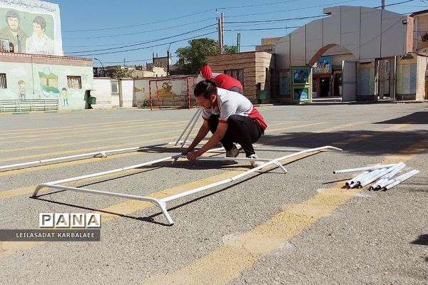 آموزش چادرزنی در پایگاه اوقات فراغت سازمان دانش‌آموزی فشافویه