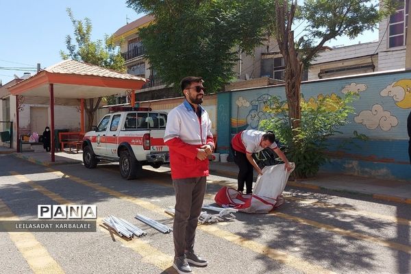 آموزش چادرزنی در پایگاه اوقات فراغت سازمان دانش‌آموزی فشافویه