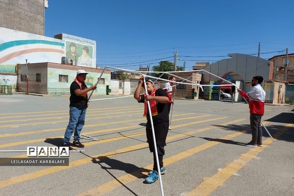 آموزش چادرزنی در پایگاه اوقات فراغت سازمان دانش‌آموزی فشافویه