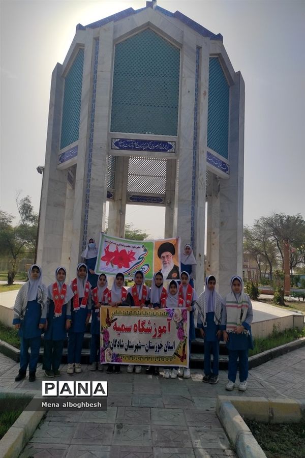 غبارروبی وعطرافشانی مزار شهدای شادگان