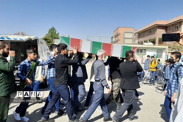 مراسم تشییع شهید گمنام در دبیرستان شهید بهشتی  رودهن