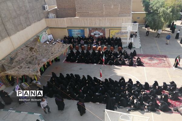 استقبال مادرانه از پیکر شهید گمنام در هنرستان برقعی قم