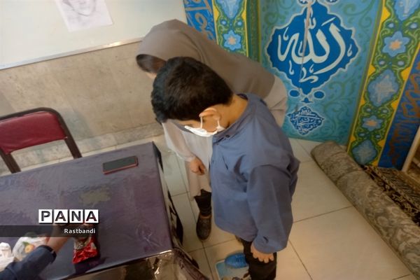 برگزاری طرح معاینه سلامتی در دبیرستان پسرانه ادیب(دوره اول)