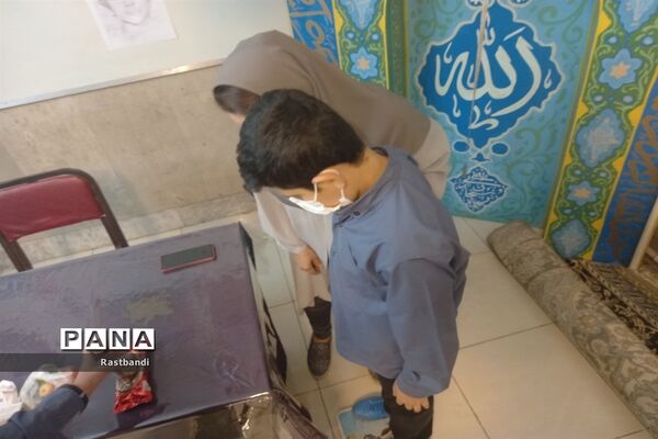 برگزاری طرح معاینه سلامتی در دبیرستان پسرانه ادیب(دوره اول)