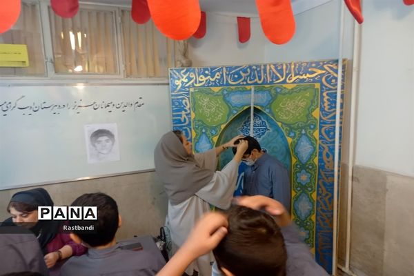 برگزاری طرح معاینه سلامتی در دبیرستان پسرانه ادیب(دوره اول)