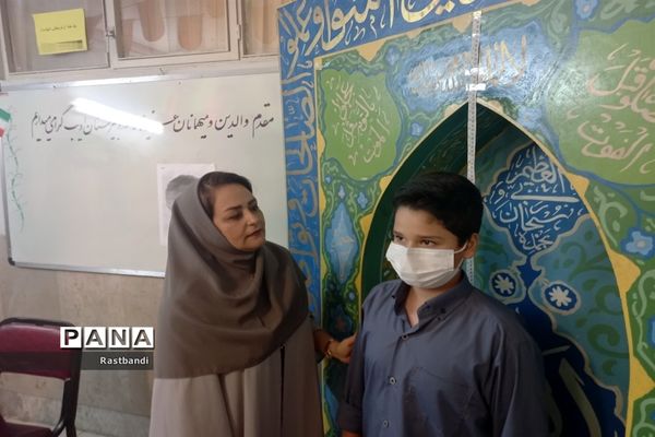 برگزاری طرح معاینه سلامتی در دبیرستان پسرانه ادیب(دوره اول)