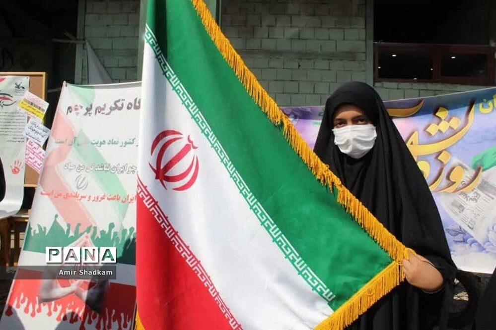 ‌آیین تکریم پرچم در راهپیمایی 13 آبان