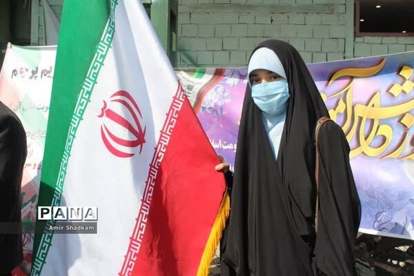 ‌آیین تکریم پرچم در راهپیمایی 13 آبان