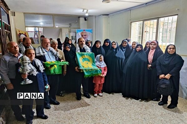آیین پرچم‌گردانی متبرک حرم ثامن الحجج امام رضا (ع) در اداره آموزش و پرورش منطقه ۱۹