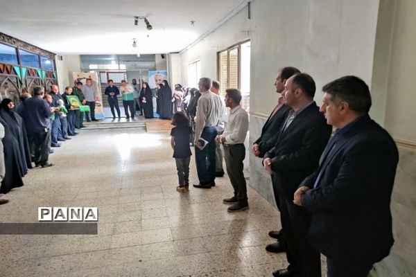 آیین پرچم‌گردانی متبرک حرم ثامن الحجج امام رضا (ع) در اداره آموزش و پرورش منطقه ۱۹