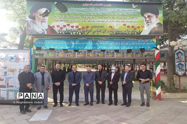 غبارروبی مزار شهدای مدافع حرم با حضور کارکنان آموزش و پرورش قم