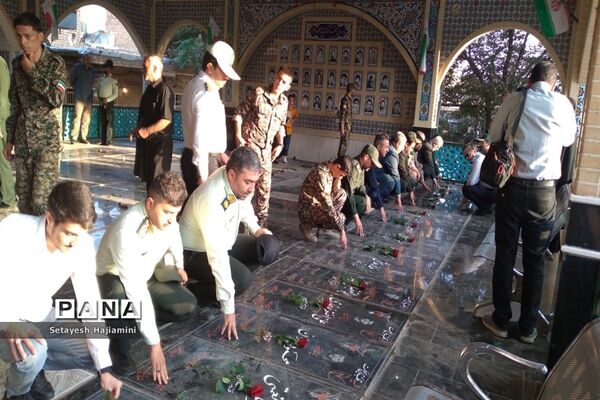 غبارروبی و عطرافشانی مزار شهدا