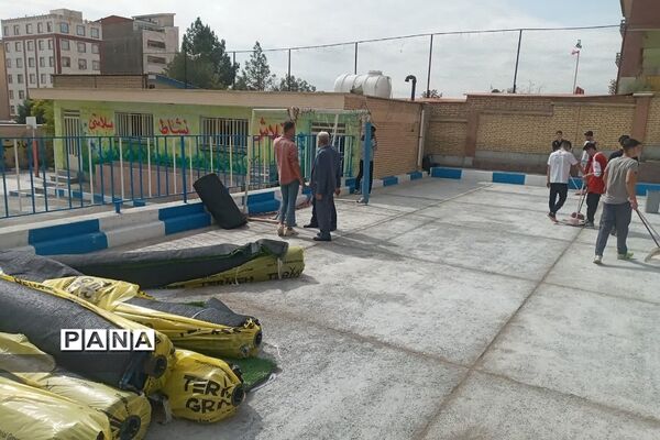 تجهیز و راه‌اندازی زمین چمن مصنوعی دبیرستان شهید بهشتی رودهن