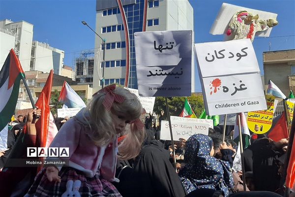 کودکان غزه در آغوش مادران جهان مقابل دفتر سازمان ملل در مشهد الرضا