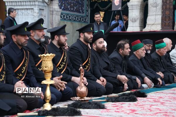 آیین نصب پرچم سیاه بر گنبد حرم حضرت معصومه(س)