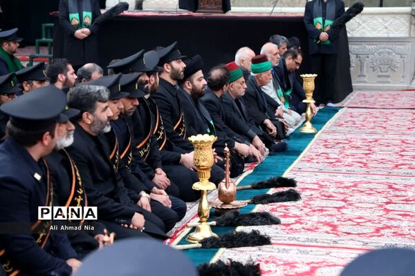 آیین نصب پرچم سیاه بر گنبد حرم حضرت معصومه(س)