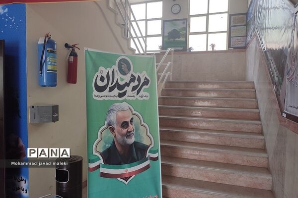 نمایشگاه عکس شهدای عاشورایی و فضاسازی محرم در دبیرستان شهید بهشتی رودهن