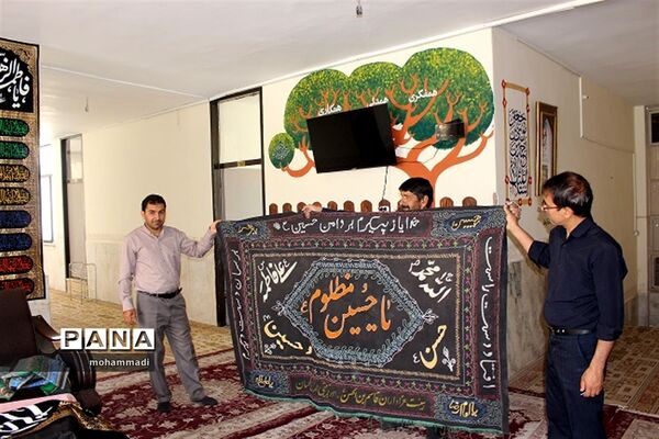 فضاسازی و سیاه پوش کردن  سازمان دانش‌آموزی استان کرمان به مناسبت ماه محرم