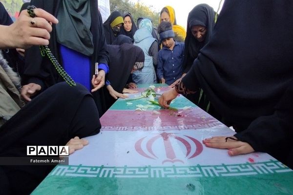 تشییع پیکر شهید گمنام در شهرستان حاجی‌آباد