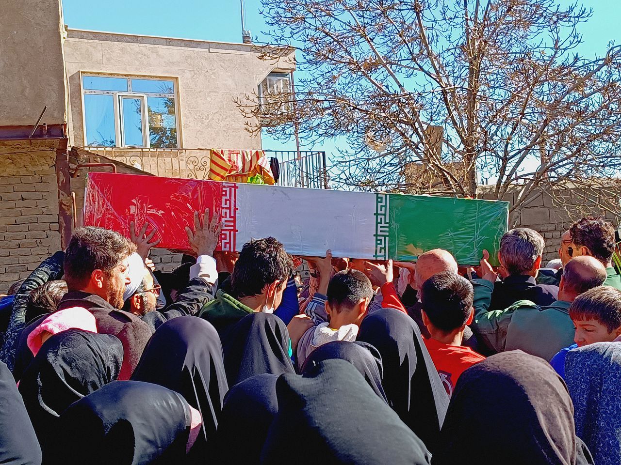 مردم علی‌آباد دمق جوکار از شهید گمنام استقبال کردند