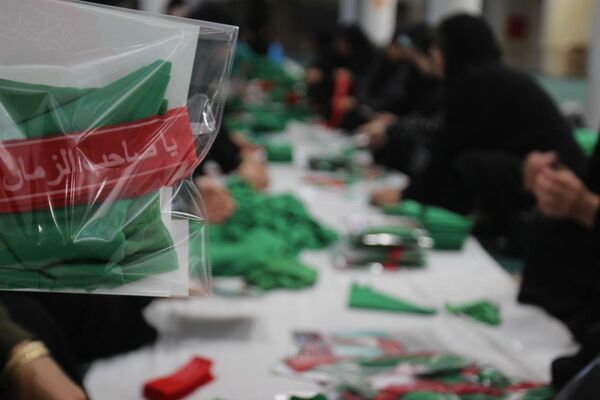 بسته‌بندی لباس همایش شیرخوارگان حسینی زنجان