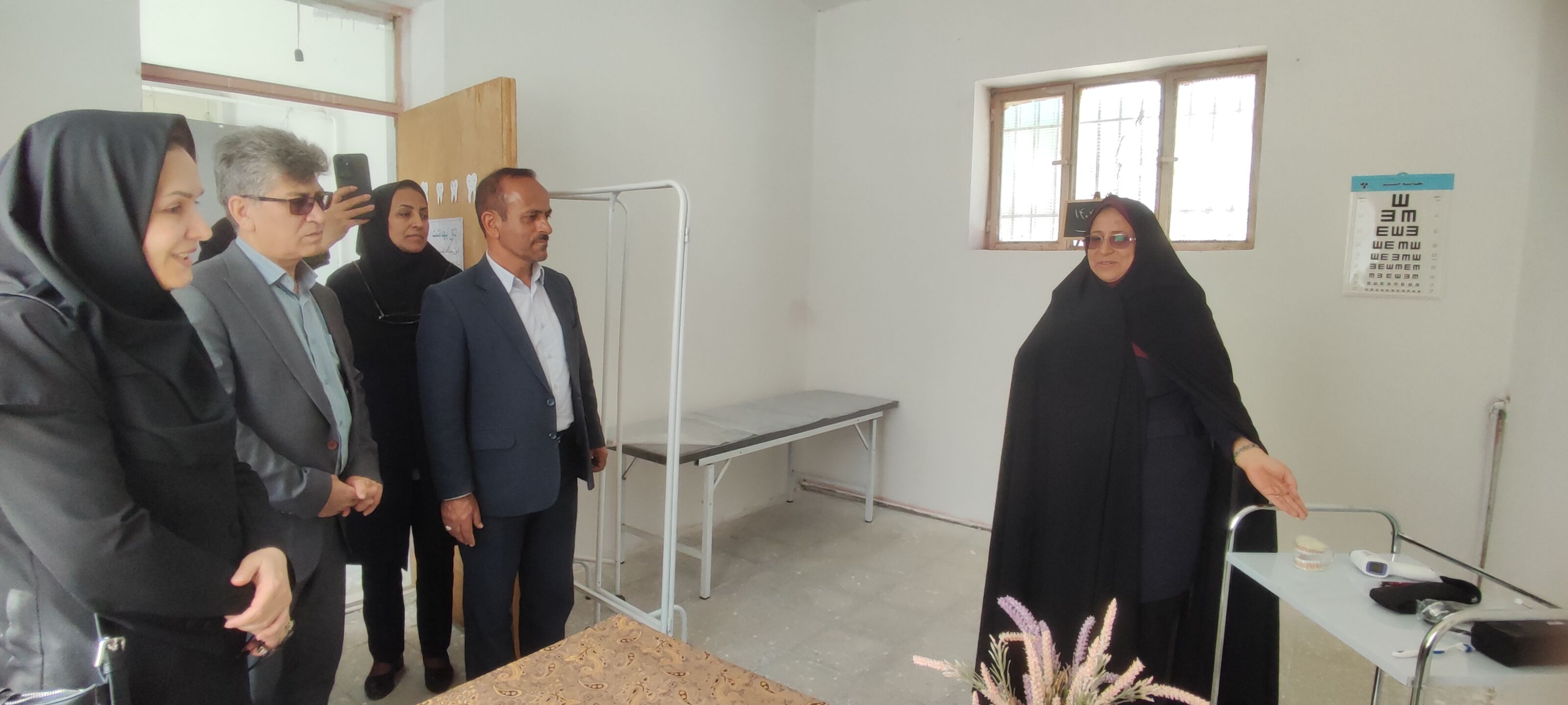 نواختن زنگ سلامت در مدرسه دخترانه ضحی ۱ شهرستان شیروان
