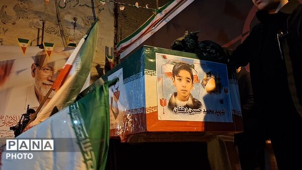 آیین وداع با پیکر دانش آموز شهید محمد حسین دهقان در قم