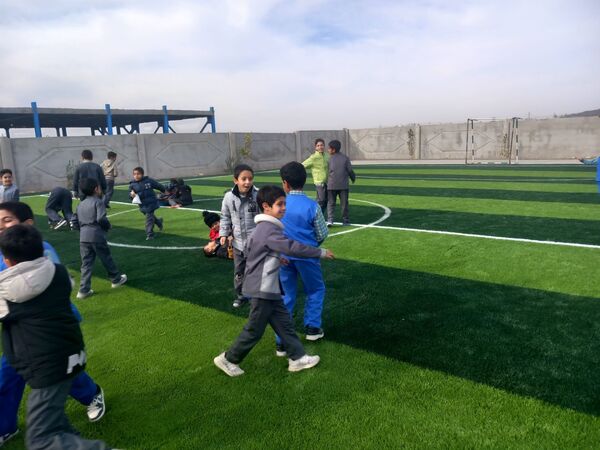 افتتاح زمین چمن مدرسه شهید غلامی خلیل آباد