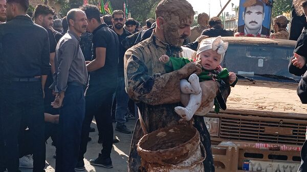زنان و مردان بن در آیین گل‌زنی؛ هم‌نوا با کاروان کربلا