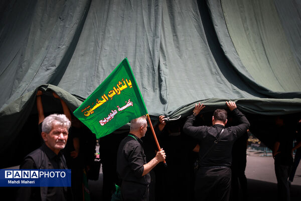 خیمه‌سوزان ظهر عاشورا در چهارراه گلوبندک تهران