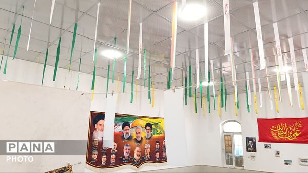 افتتاح نمایشگاه شهدای جنگ رمضان در روستای مومن آباد قم