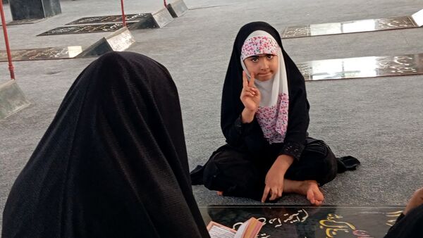 محفل انس با قرآن و یادواره «شهید احمد محمد مشلب» در شهر بن