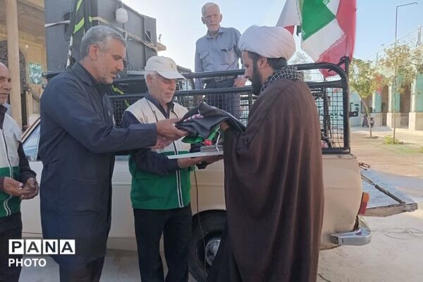برافراشته شدن پرچم عزای حسینی در امامزاده قاسم زرقان