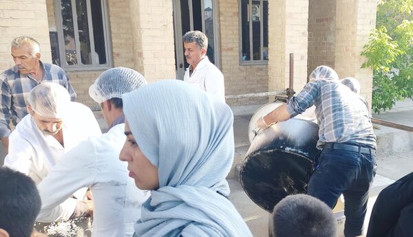 توزیع غذای گرم به‌مناسبت عید سعید غدیر خم در بجنورد