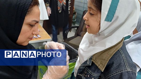 اجرای طرح وارنیش فلوراید در دبستان لطیفه 