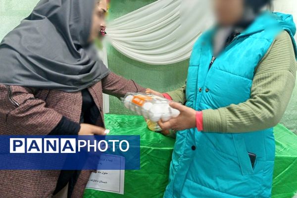 توزیع بسته‌های معیشتی در مدرسه عمار نصیرشهر