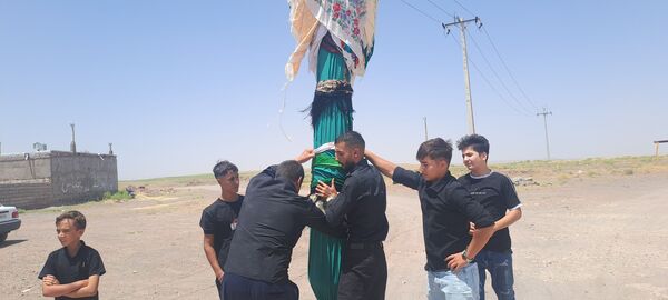 عزاداری ظهر عاشورا در روستای حسن آباد بلهر 