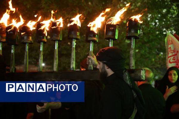 آیین «مشعل گردانی» نجفی‌های مقیم قم