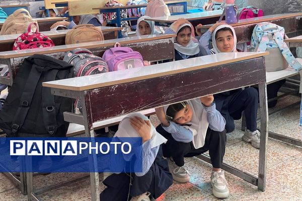 مانور تخلیه اضطراری و آمادگی برای لحظات بحرانی در مدرسه معراج بهارستان‌دو