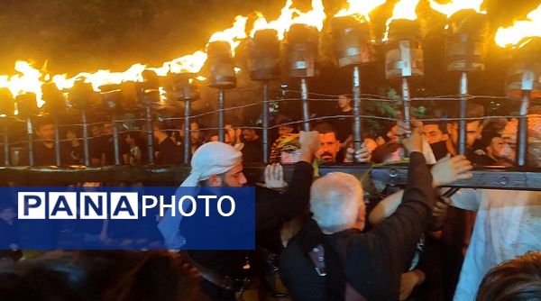 آیین مشعل‌گردانی نجفی‌های مقیم قم