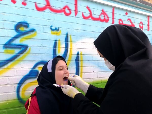 وارنیش فلوراید برای دانش آموزان دبستان ناهید نخودی 