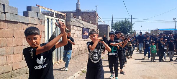 عزاداری ظهر عاشورا در روستای حسن آباد بلهر 