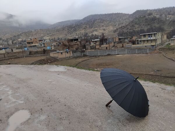 چشم‌انداز میانکوه در باران