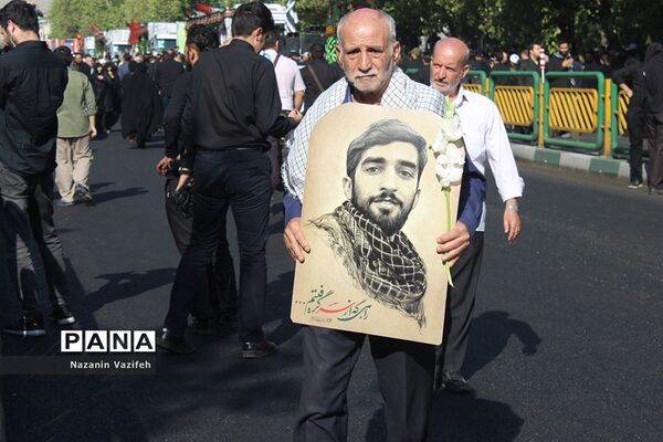 وداع باشکوه عزاداران حسینی با پیکر مطهر شهیدان هشت سال دفاع مقدس