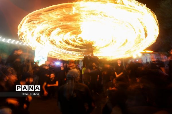 آیین مشعل‌گردانی در دولت‌آباد تهران