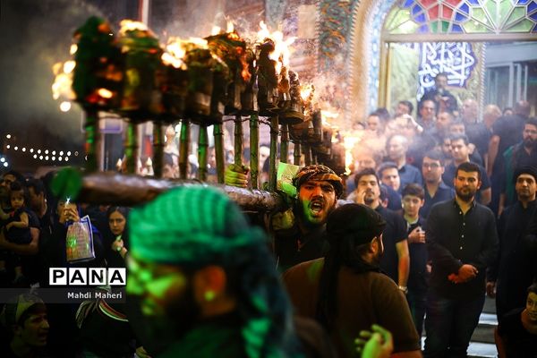 آیین مشعل‌گردانی در دولت‌آباد تهران