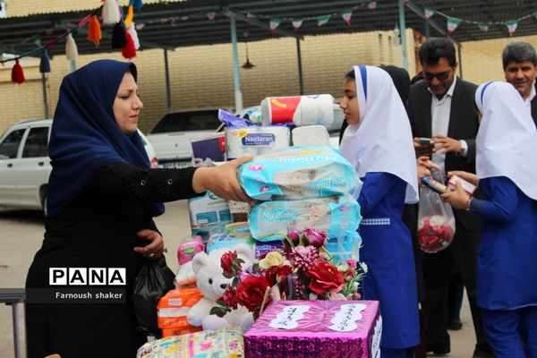 مدرسه مصلحیان شهرستان بوشهر کمک به سیل زدگان