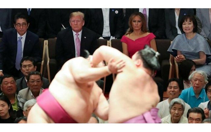 ترامپ و همسرش به تماشای کشتی "باورنکردنی" سومو نشستند +تصاویر