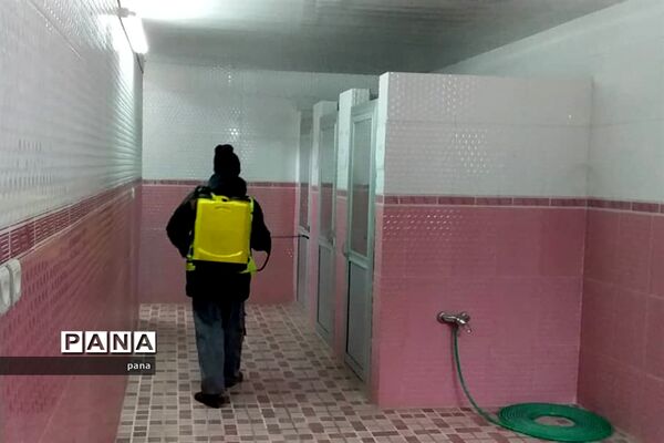 ضدعفونی امکان عمومی ماموران شهرداری گوگان