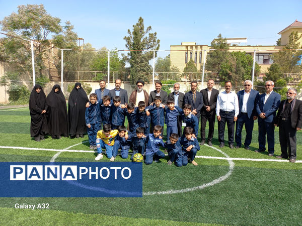 آیین افتتاح زمین چمن مدرسه بهار نور معرفت در قم